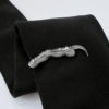 Raven claw sterling silver tie bar on a black tie for gothic wedding