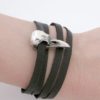 Small silver raven skull bracelet with black leather