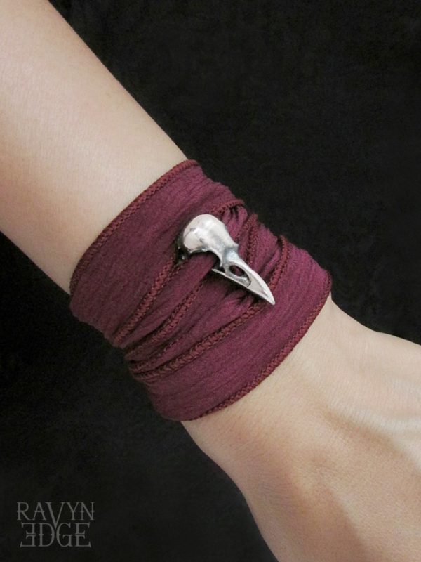 Wine red silk wrap bracelet with silver raven skull
