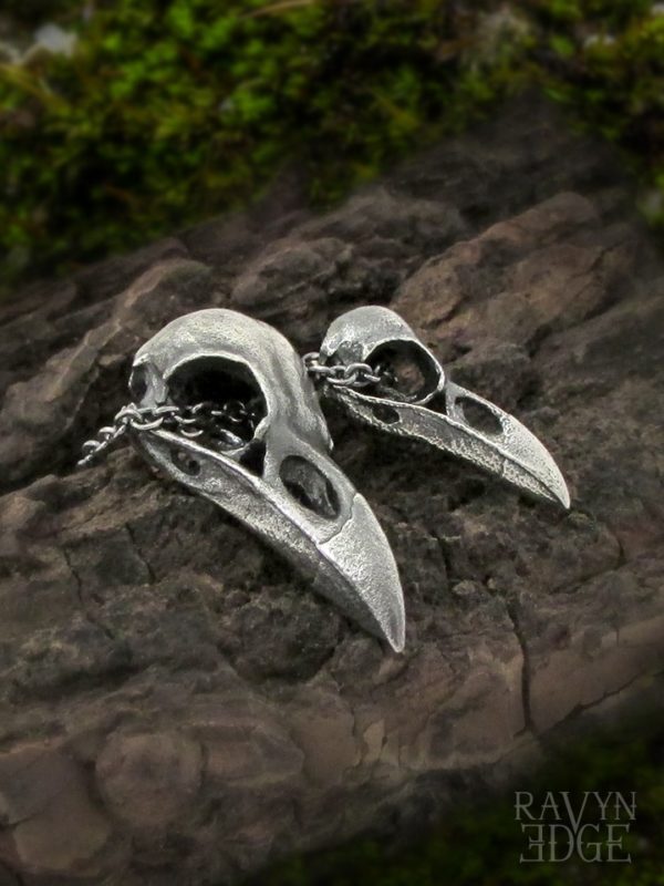 Small and medium raven skull matching necklaces for couples