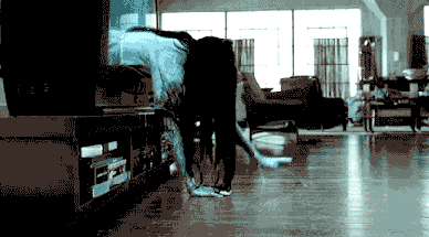 Sadako from the Ring crawling out of the television