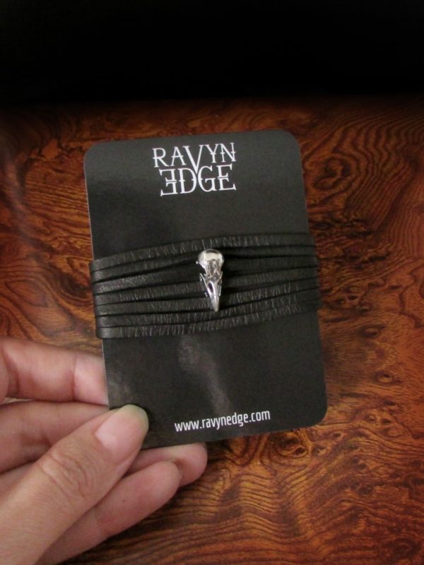 Tiny crow skull and black leather wrap bracelet