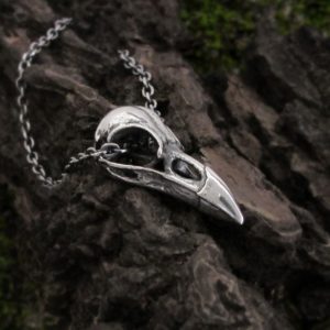 Small raven bird skull necklace in sterling silver