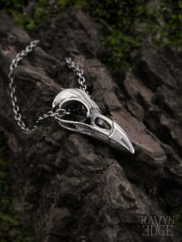 Small raven bird skull necklace in sterling silver