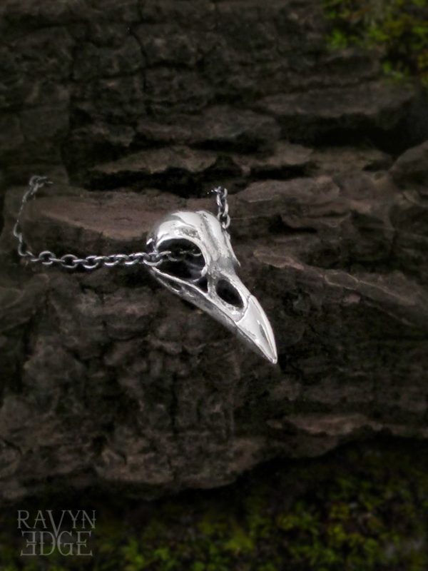 Small raven skull or crow skull necklace in sterling silver