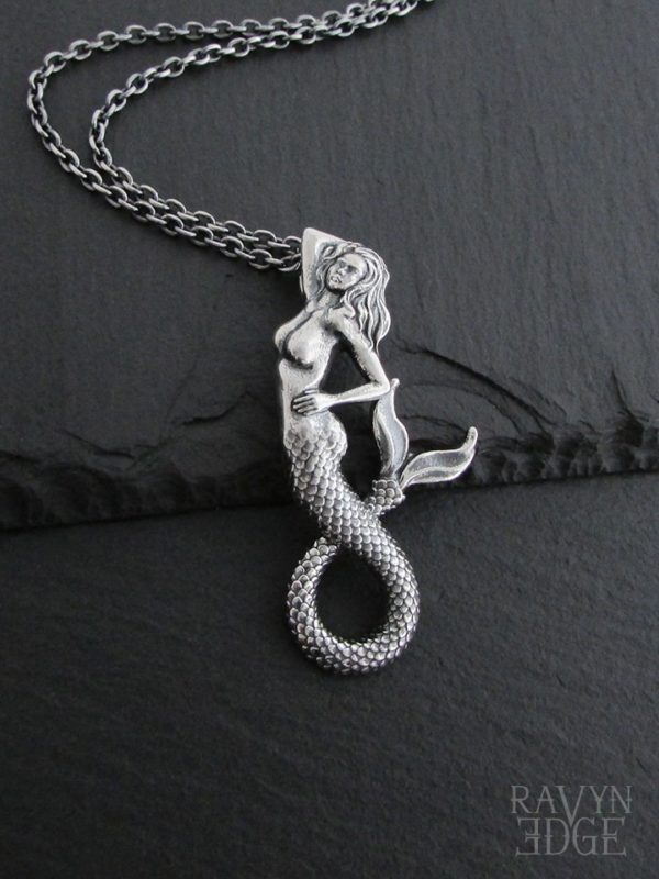 Silver mermaid amulet