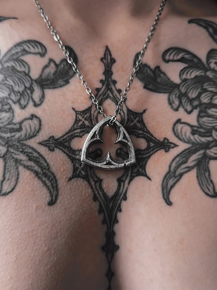 Kellsey wearing the silver trefoil window necklace