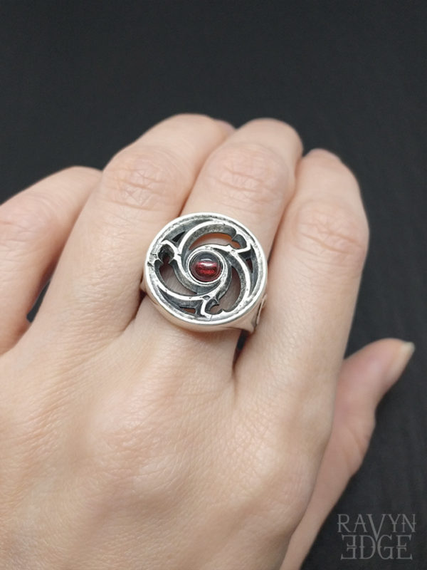 Triskele gothic window signet ring in sterling silver with garnet