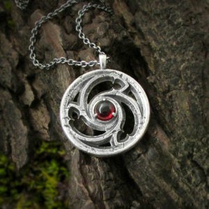 Triskele Window Necklace with Garnet