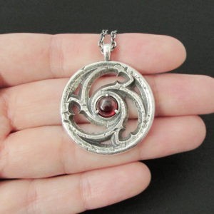 Triskele Window Necklace with Garnet