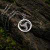 Small triskelion window necklace in sterling silver