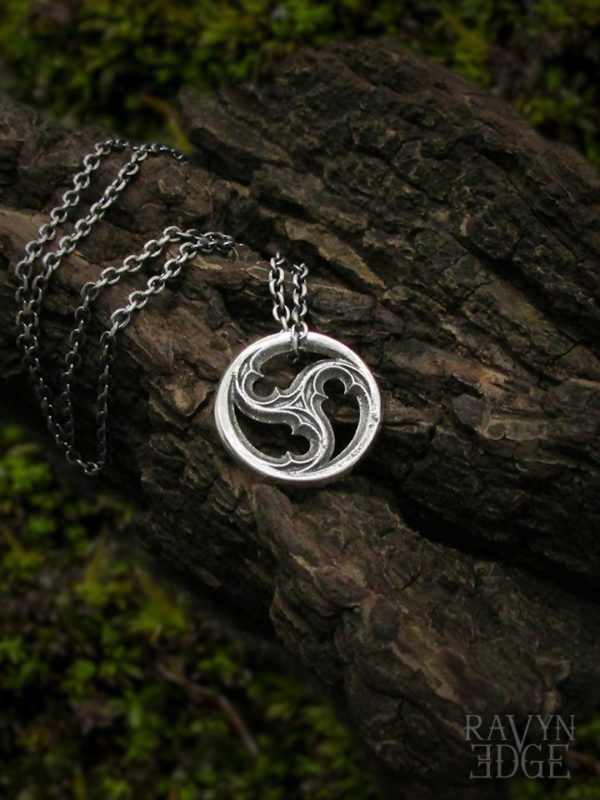 Small triskelion window necklace in sterling silver