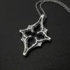 Bethlehem star necklace with quatrefoil gothic window