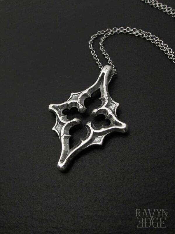 Bethlehem star necklace with quatrefoil gothic window